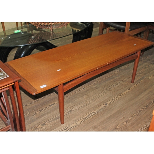 177 - A mid 20th century teak coffee table by younger, length 137cm.