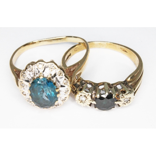 29 - Two hallmarked 9ct gold rings: a topaz and diamond cluster and a diamond and sapphire ring, gross wt... 