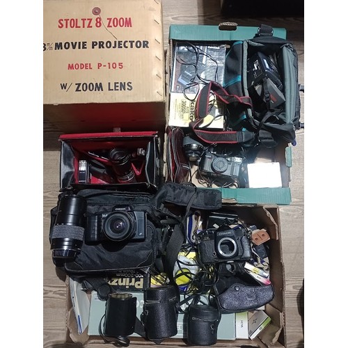 294 - 2 boxes of cameras and accessories to include a cine cam, Olympus DX, vintage headphones, Chinon, Vi... 