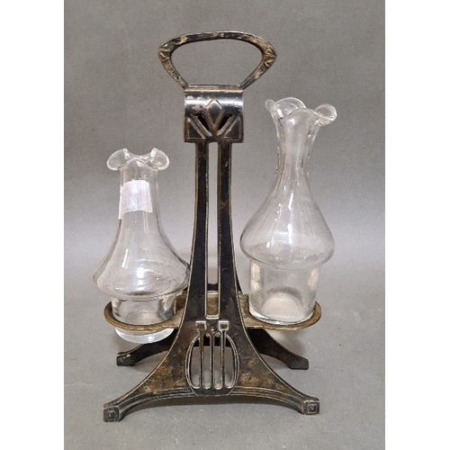 246 - A WMF silver plated cruet stand with two non matching glass bottles, height 25cm, marked WMF.