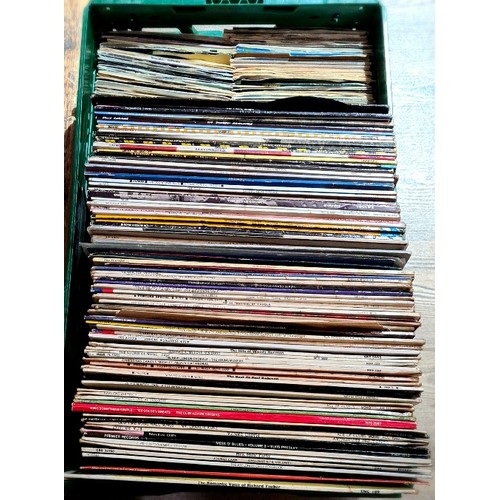 177 - A box of approx. 80 LPs including Bowie, Madness, The Specials, The Human League, Queen, various 45s... 