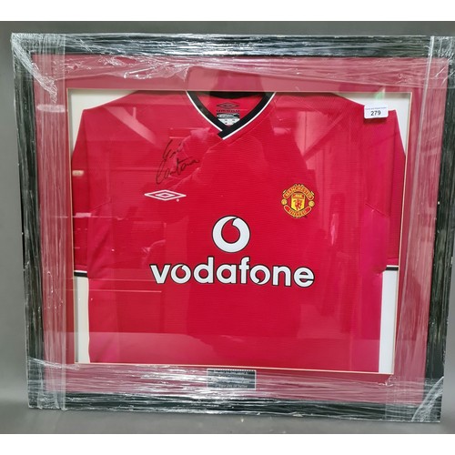 279 - 2 signed Manchester United f.c. shirts, framed and glazed.