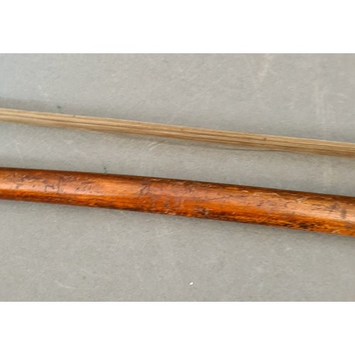 134 - A cello bow.