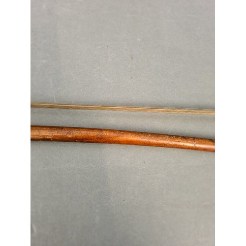 134 - A cello bow.