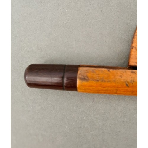 134 - A cello bow.