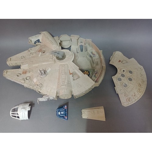 97 - 3 vintage star wars toys to include a Millennium Falcon, Darth Vader's Star Destroyer and an AT-AT, ... 