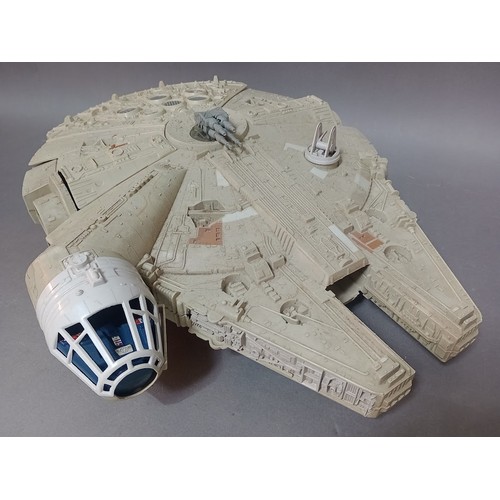 97 - 3 vintage star wars toys to include a Millennium Falcon, Darth Vader's Star Destroyer and an AT-AT, ... 