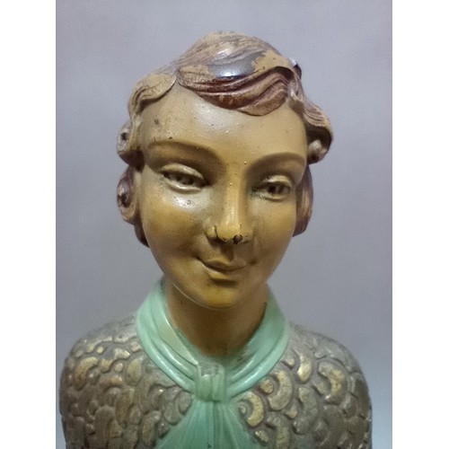 229 - An Art Deco cold painted spelter figure of a lady holding a dove on marble base.