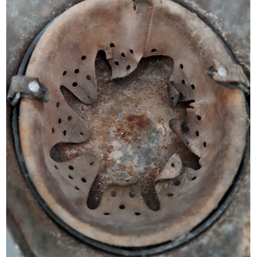 249 - A WW2 German M42 military steel helmet with some remnants of original paint on surface.