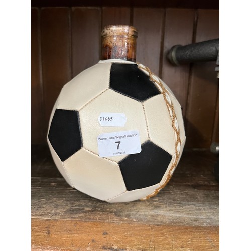 7 - A bottle of unidentified wine/liquor, the bottle modelled as a football.