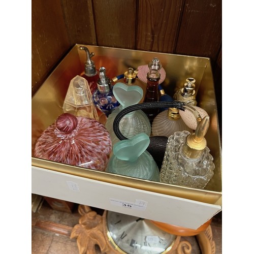 35 - A selection of scent/ perfume bottles to include cut glass, etc.