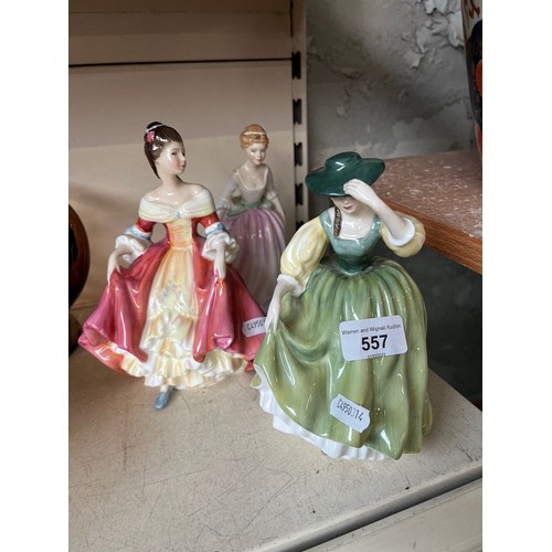 557 - Three Royal Doulton figures by Peggy Davies including 'Southern Belle' 1957, 'Buttercup' 1963 and 'A... 