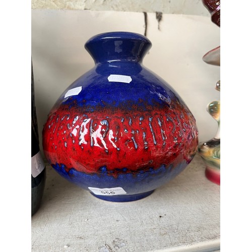 555 - A West German pottery blue and red glazed vase.