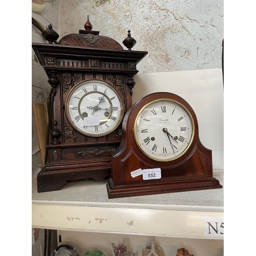 552 - Two clocks; an oak cased chiming mantle clock, the movement stamped Junghan's, together with a Commi... 