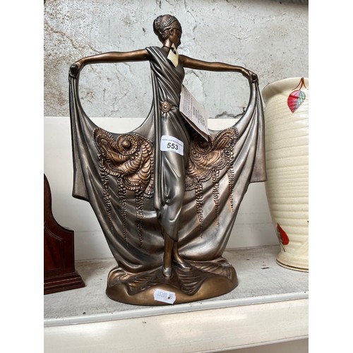 553 - A modern Art Deco style lady figure by Austin Sculpture.