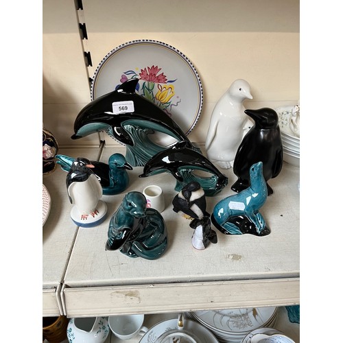 569 - 7 items of Poole pottery together with 6 items featuring penguins