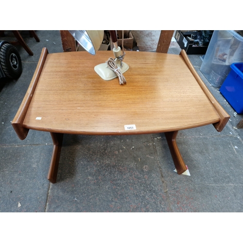 1053 - A mid 20th century G Plan teak coffee table.