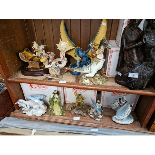 25 - A group of 9 Enchantica figurines.