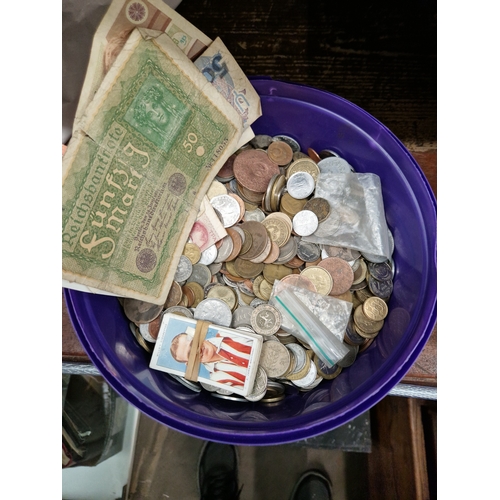 17 - A tub of world coins and banknotes