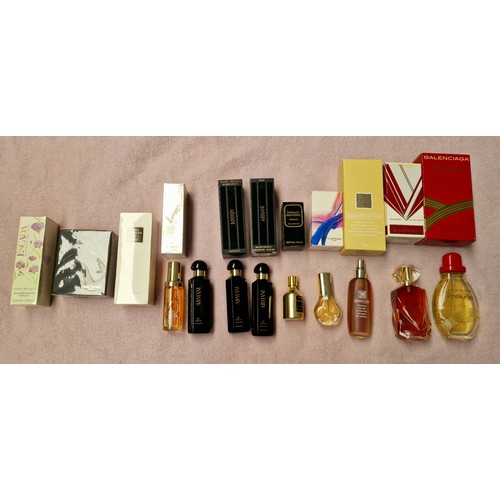 54 - A box of perfumes to include Louis Feraud, Armani, Escada, Gianni Versace, Balenciaga, Alexandra de ... 