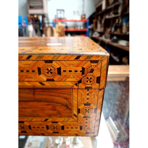 50 - A Victorian walnut sewing box with Tunbridge ware inlay.