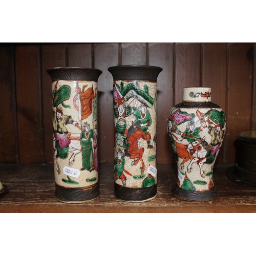 19 - A group of three Chinese archaic style vases, crackle glaze with over enamels, tallest 19.5cm.