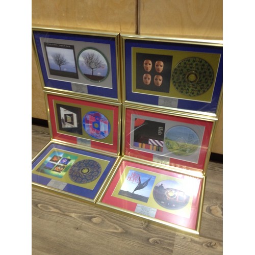 9 - A group of six Pink Floyd and associated framed CDs comprising Echoes, The Final Cut, Take It Back, ... 