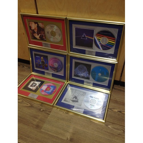 10 - A group of six Pink Floyd and associated framed CDs comprising Pulse, The Dark Side of The Moon, Ech... 