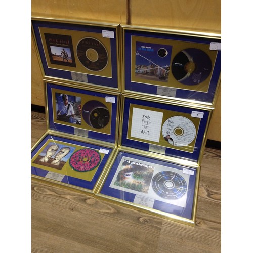 7 - A group of six Pink Floyd and associated framed CDs comprising The Division Bell, Delicate Sound of ... 