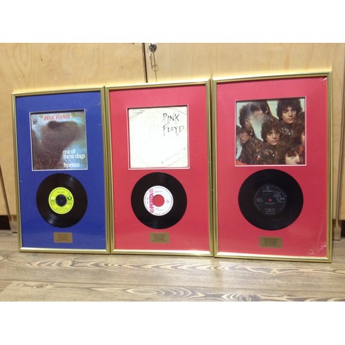 1 - Three Pink Floyd framed vinyl singles comprising See Emily Play, One of These Days and French releas... 