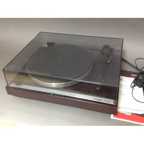 12 - A Thorens TD 321 suspended chasis turntable with Linn Basik LV X tone arm and Linn K9 stylus.