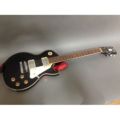 60 - An Encore Les Paul style electric guitar.