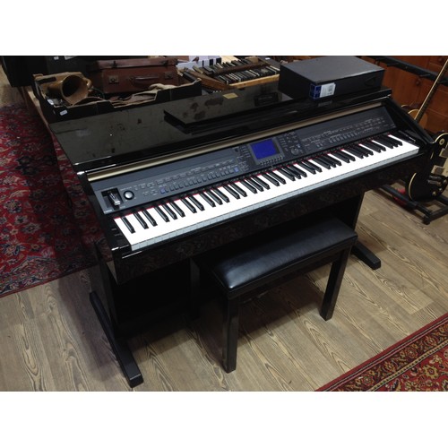 61 - A Yamaha Clavinova CVP-401 electric keyboard.