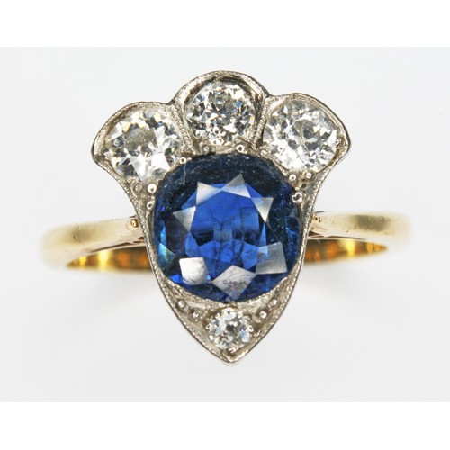 108 - A diamond and sapphire cluster ring, the central round cut sapphire weighing approx. 1.23cts, four m... 