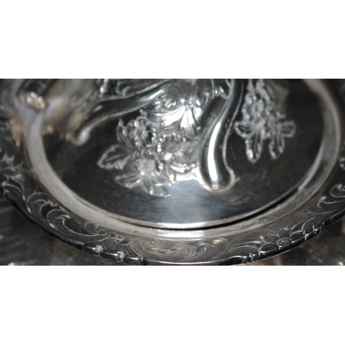 118 - A William IV Scottish silver tea set, repousse decoration depicting floral bouquets and scrolls, Eld... 