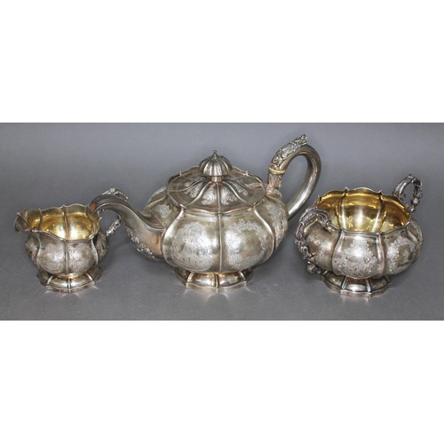 119 - A George IV three piece silver tea set, compressed melon form, bright cut engraved with scrolls, Jon... 