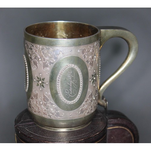 124 - A Victorian bright cut engraved silver tankard, gilt interior, George Fox, London 1871, height 8.5cm... 