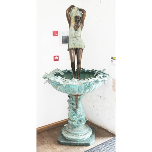 138 - A bronze garden fountain, modelled as a woman with water jug, bowl decorated with vine leaves and gr... 