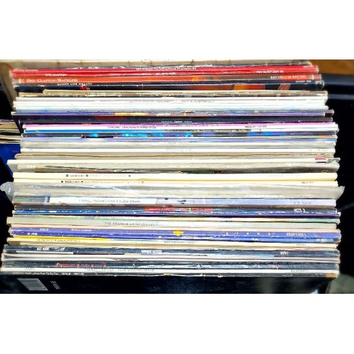 22 - A box of approx. 59 LP records and some singles, circa 1970s and 1980s including Rolling Stones, Yes... 