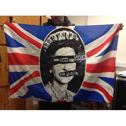 193 - An original Sex Pistols God Save The Queen flag, circa 1980, 105cm x 74cm, after the iconic poster d... 