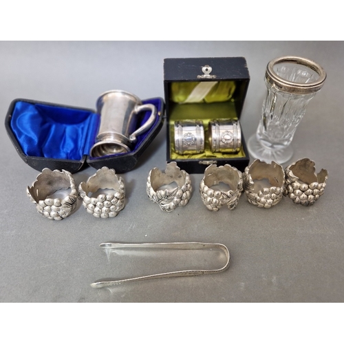 50 - A collecton of assorted silver and silver plate comprising a cased hallmarked silver christening mug... 