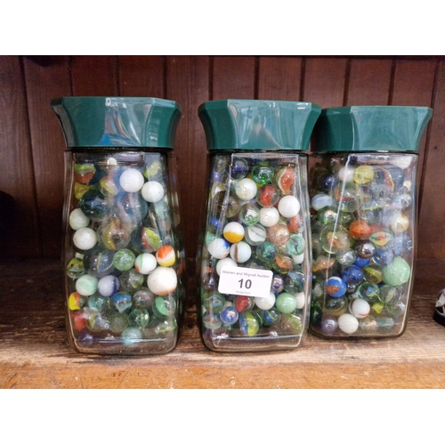 10 - Three jars of marbles.