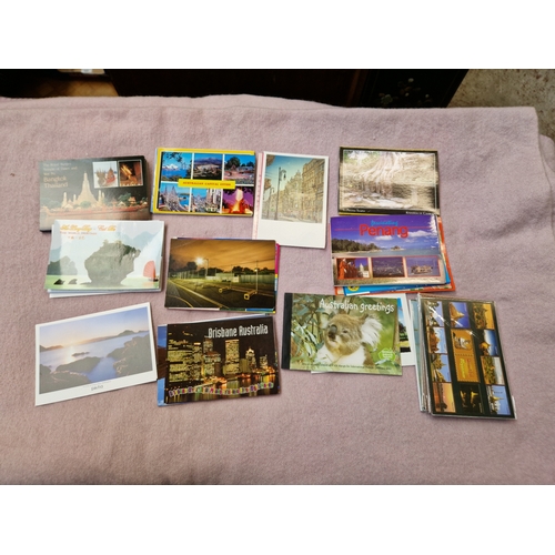 41 - A box containing unused post cards and video photo discs