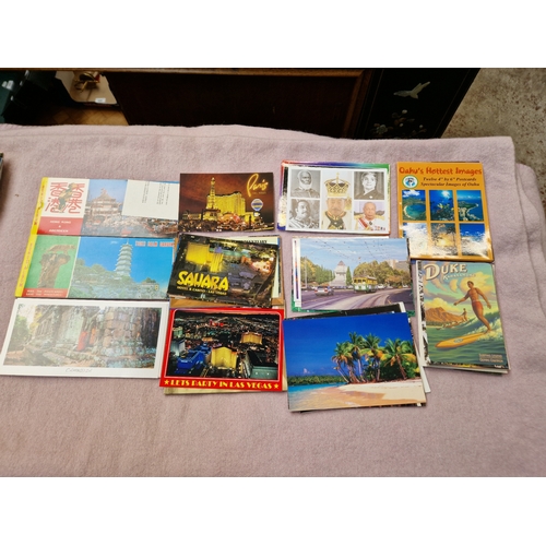 41 - A box containing unused post cards and video photo discs