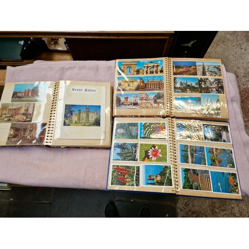 42 - Three albums of picture postcards including Scotland and European Countries