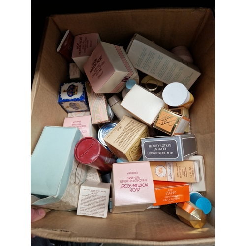 59 - A box of perfumes and cosmetics