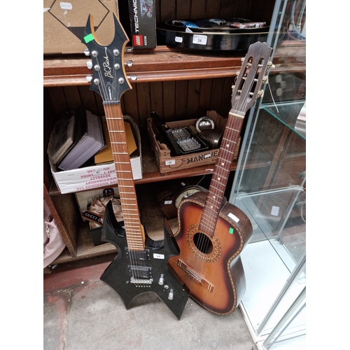 69 - A B C Rich Warbeast electric guitar (as found), and a Caponnetto acoustic guitar