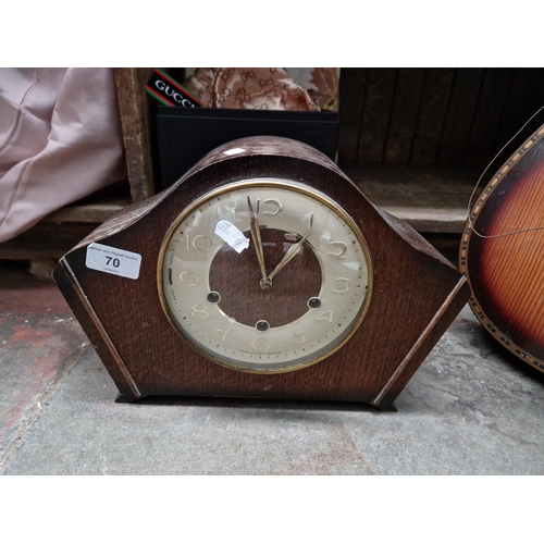 70 - A Westminster chime mantle clock with key and  pendulum