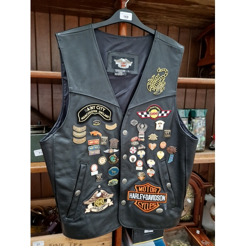 169 - A gents leather Harley Davidson waistcoat, Large size, with 6 various Harley Davidson and motorcycli... 