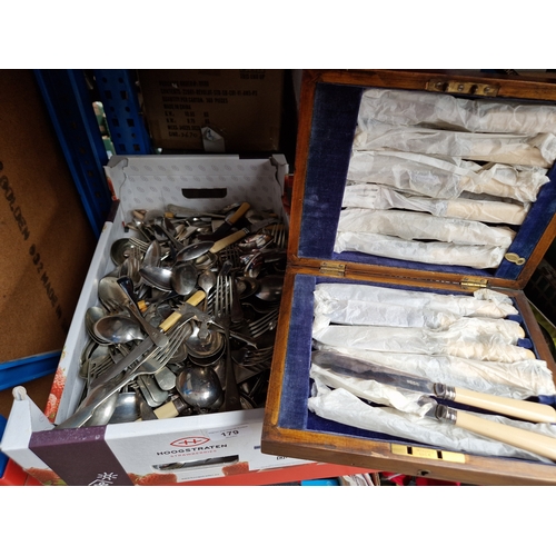 179 - A box of mixed cutlery and a cased set of fish knives and forks